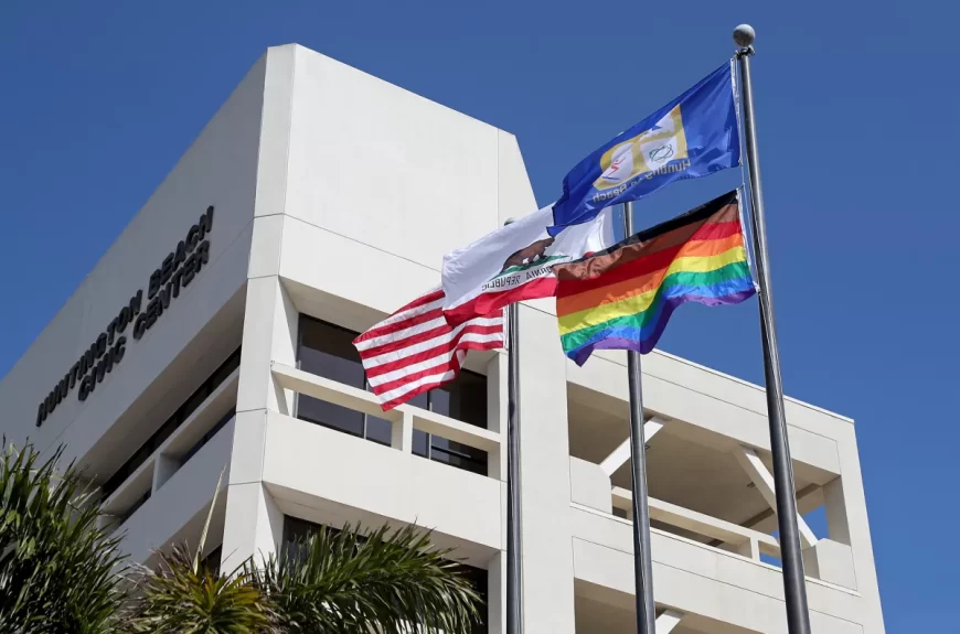 LGBTQ Pride Flags flying over a Goverment building in Huntington Beach